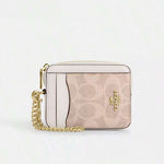 ESTUCHE DE CARTERA CON CREMALLERA MINI COACH
