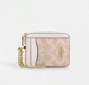ESTUCHE DE CARTERA CON CREMALLERA MINI COACH